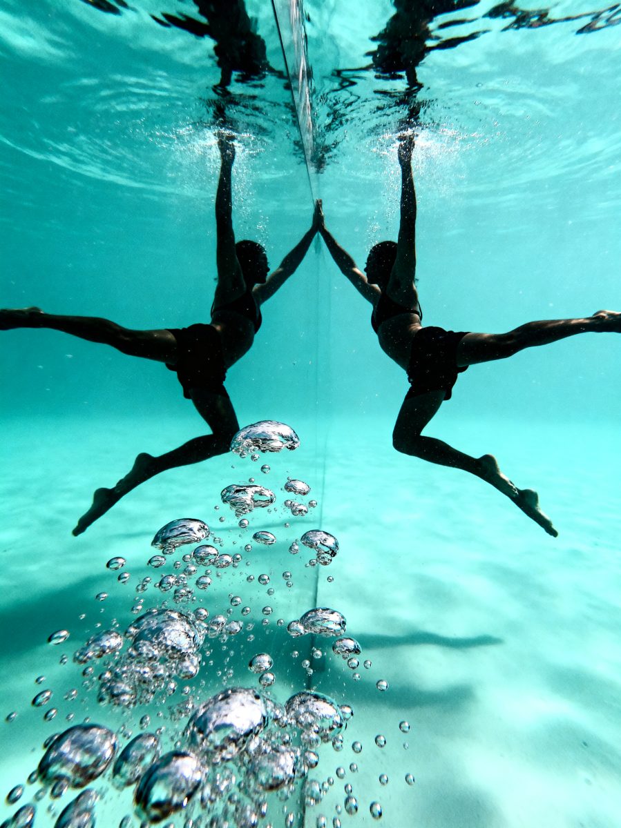 Synchronized Swimmers Mirrored Underwater